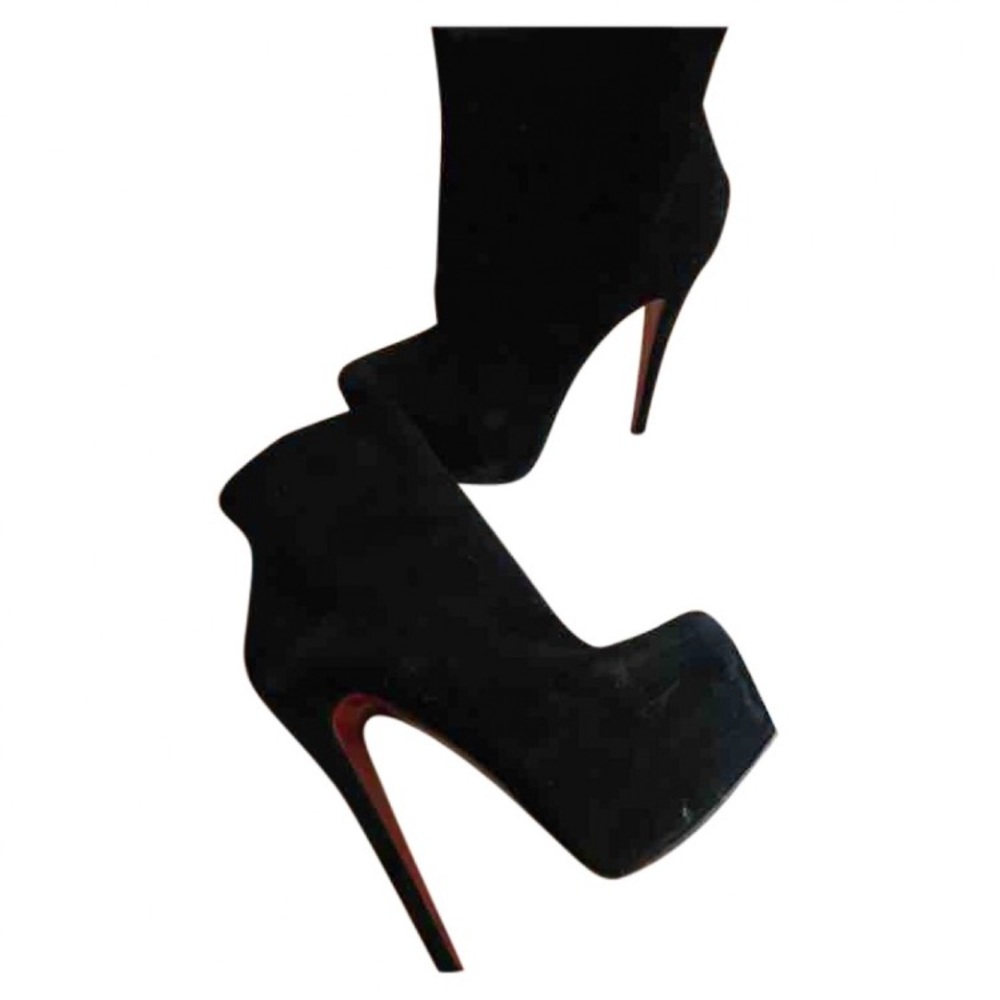 Christin Louboutin daffodil booties